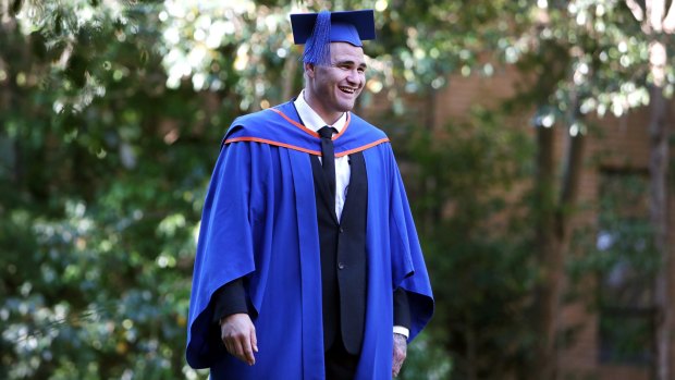 Turning his life around: Russell Packer graduating from university of Wollongong.