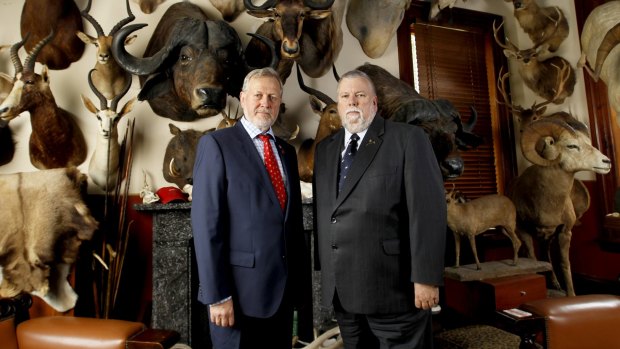 Shooters party members Robert Borsak and Robert Brown in the Billiard room of Mr Borsak's Ashfield home.