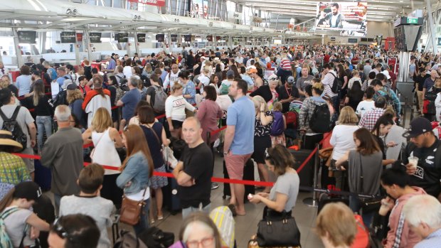 The flight delays and cancellations caused huge crowds to fill Sydney Airport's terminals.