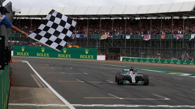 Mercedes driver Lewis Hamilton claims the British Grand Prix on Sunday.