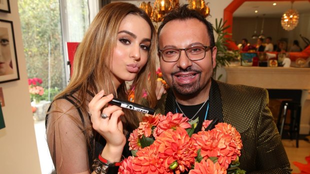 Model, school-goer and beauty businesswoman Lianna Perdis with her father, Napoleon, at the launch of new additions to the Total Bae collection.