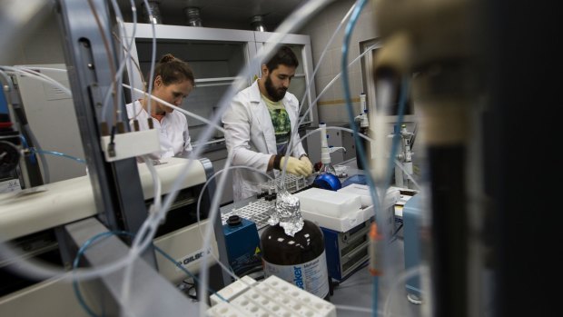 Employees work at Russia's national drug-testing laboratory in Moscow. It was at this laboratory that Grigory Rodchenkov says he was giving Russian athletes a "cocktail" of banned substances.
