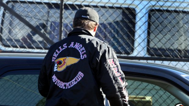 A man in a Hells Angels jacket outside the gang's Seaford club house in 2013. 