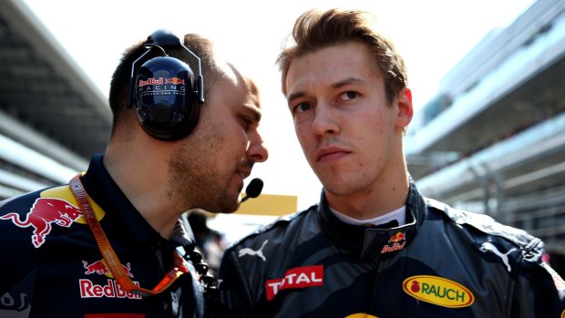 Daniil Kvyat (right) apologised to Sebastian Vettel.