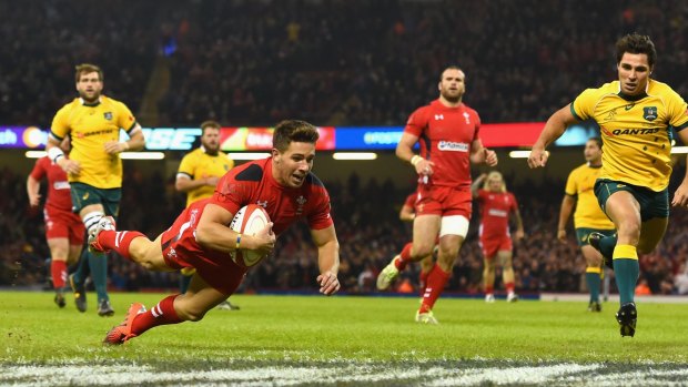 Perfect start: Rhys Webb scores for Wales in the fourth minute.