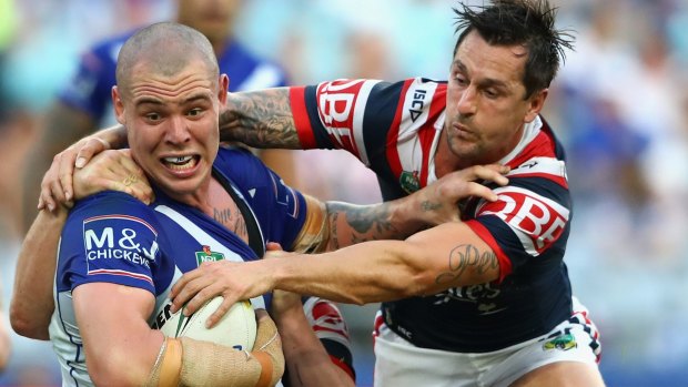 Powering on: David Klemmer takes Mitchell Pearce for a ride.