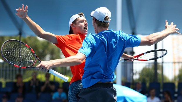 Overjoyed: Alex De Minaur and Blake Ellis.