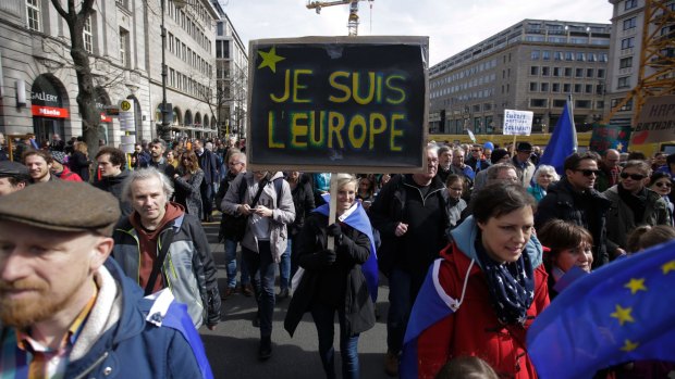 Across Europe, people took to the streets on Saturday in support of the European Union. Here, people march through Berlin.