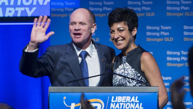 Campbell Newman, with his wife Lisa, waves goodbye to politics following the LNP's 2015 state election loss.