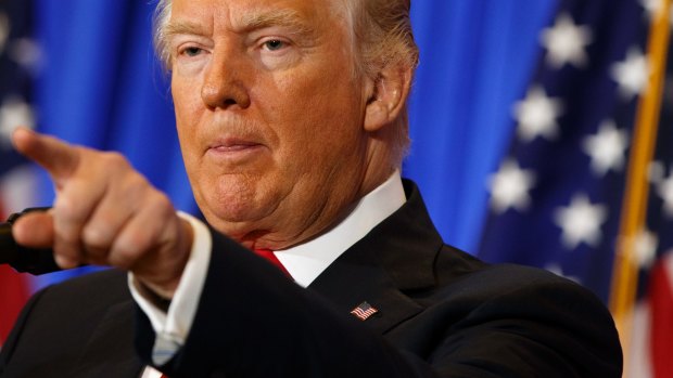 President-elect Donald Trump speaks during a news conference in the lobby of Trump Tower in New York.