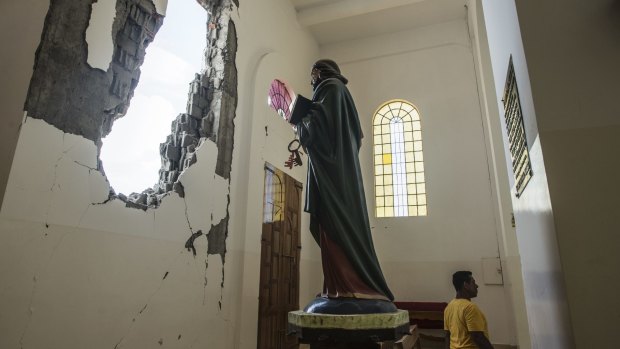 Damage from the earthquake at the basilica in Montecristi.