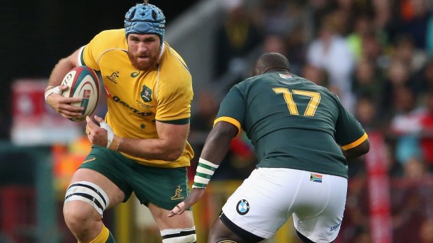 Experienced: James Horwill on the charge for the Wallabies in 2014.