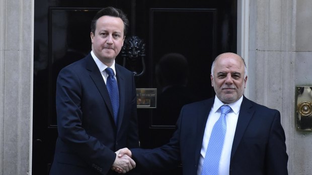 Britain's Prime Minister David Cameron greets Iraq's Prime Minister Haider al-Abadi before the meeting in London.