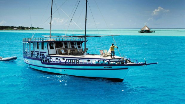 Swim, snorkel and sail aboard a dhoni in the Maldives with World Expeditions.