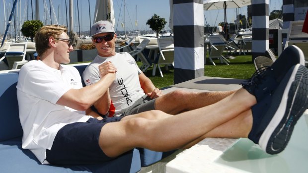 Kicking back: Olympic swimmer Mack Horton with James Spithill during promotions for the Sydney to Hobart.