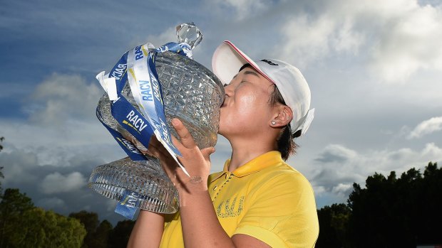 Special win: Jiyai Shin of South Korea celebrates with the trophy at Royal Pines.