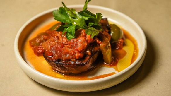 M'nazaleh, caramelised eggplant braised with tomatoes and green peppers.
