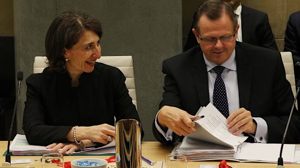 NSW Treasurer Gladys Berejiklian next to Rob Whitfield, who is the outgoing Treasury Secretary. 
