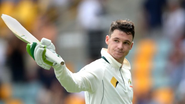Handscomb salutes the crowd after his dismissal for 