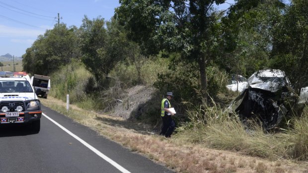 Police at the site of a crash at Hoya, south of Ipswich on Friday.