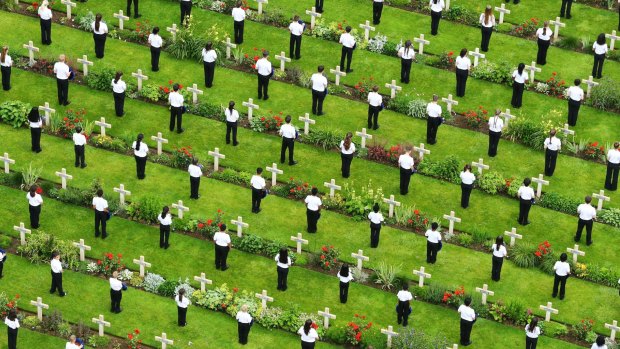 Young people lay wreaths during a service last year to mark the 100th anniversary of the start of the battle of the Somme at the Commonwealth War Graves Commission Memorial.