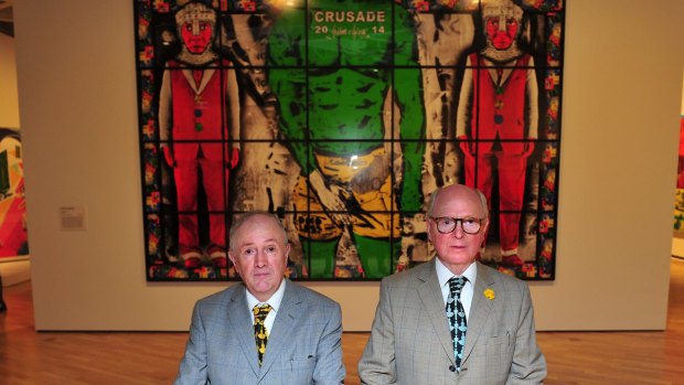 Gilbert and George in front of their work at the National Gallery of Australia.