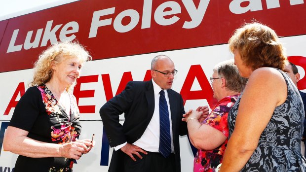 "There's an appetite for change": Mr Foley talks with locals during the Country Labor Campaign launch in Singleton. 