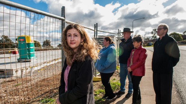 Giralang residents from left, Sarah Hulbert, Susan White, Noel White, Margaret Matthews and Paul Leighton remain frustrated by challenges to the approved plans for a 1500-square-metre supermarket.