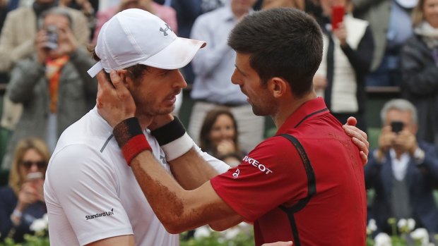 Andy Murray congratulates Novak Djokovic.