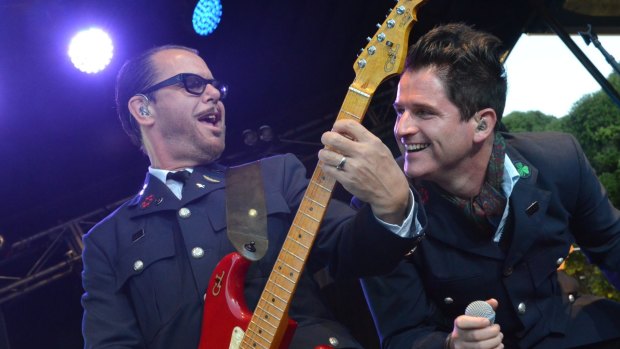 Kirk Pengilly of INXS (left) reportedly misses being able to slap women's bottoms.