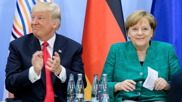 Donald Trump and German Chancellor Angela Merkel on the second day of the G20.