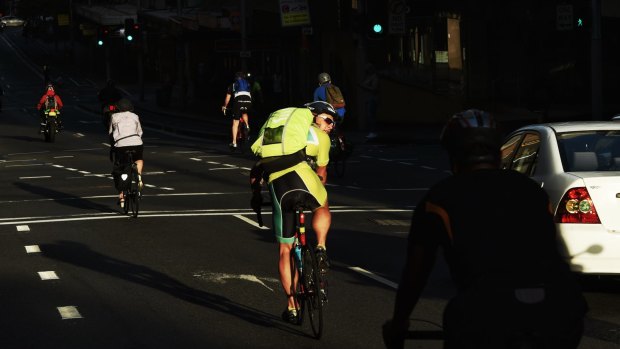 Cyclists in NSW face significantly higher penalties for offences such as running red lights from Tuesday. 