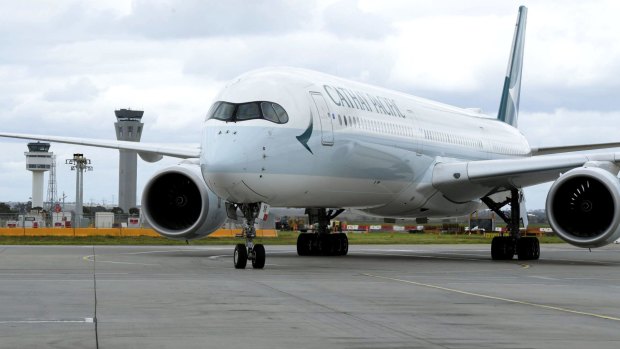 The Cathay Pacific Airbus A350-1000 arrives at Melbourne Airport on Sunday.