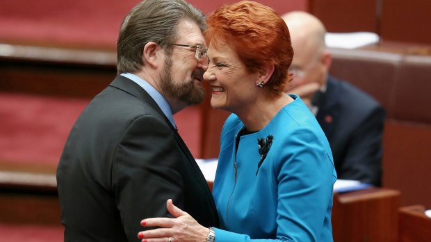 In happier times: Senator Hanson is congratulated by Senator Hinch after last year's election.