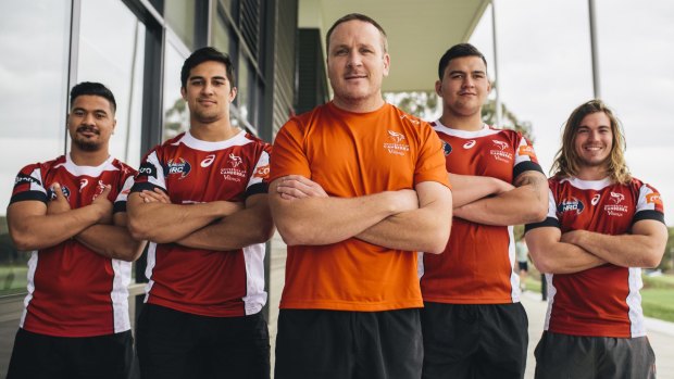 Vikings coach Brad Harris, centre, with players Rodney Iona, Dean Oakman-Hunt, Tyrel Lomax and Rowan Perry will tour NZ with the NRC Barbarians next month.