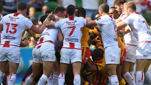 Push and shove: England and Papua New Guinea players clash.