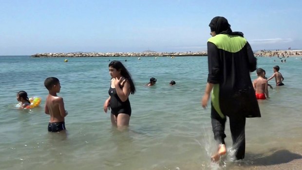 A Muslim woman enjoying the beach in Marseille.