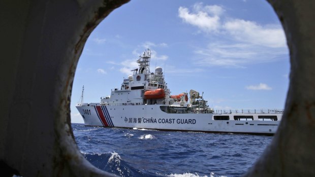 A Chinese Coast Guard ship attempts to block a Philippines government vessel as the latter tries to enter Second Thomas Shoal in the South China Sea.