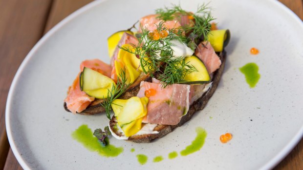 Smoked salmon on rye with pickled zucchini.