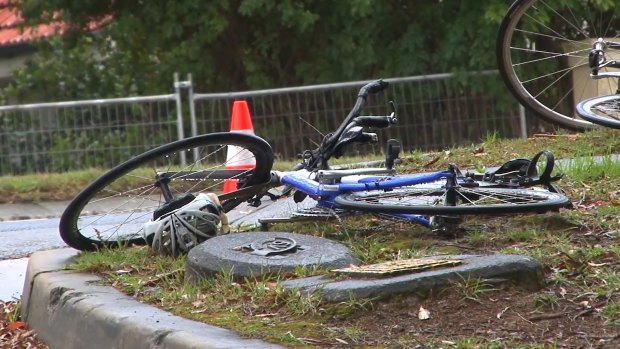 A bicycle lies abandonded near the site of the collision on Mona Vale Road.