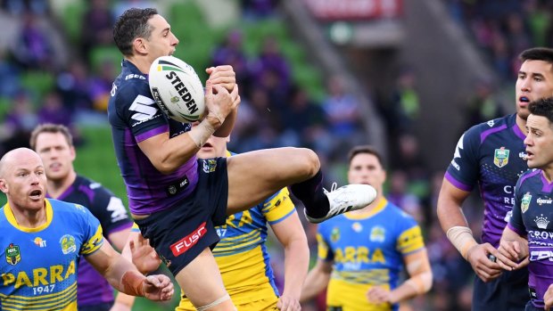 Bombs away: Billy Slater juggles the ball against the Eels at AAMI Park.
