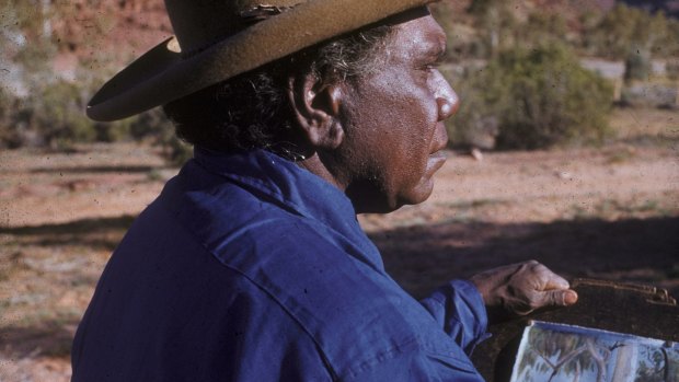 Albert Namatjira painting in the Australian outback.