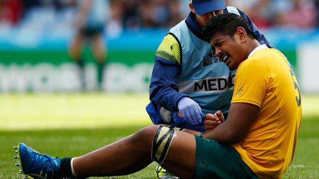 Scratched: Will Skelton feels the pain against Uruguay.
