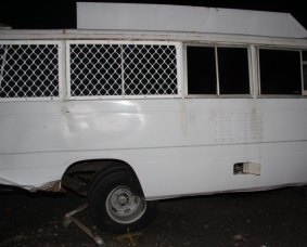 Damage to the rear of the bus.