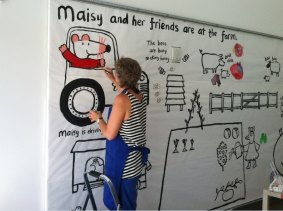 Lucy Cousins at work creating a mural of Maisy Mouse, star of the children's book series.