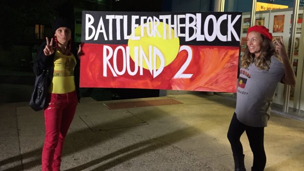 Protesters, pictured outside Redfern's Community Centre on Thursday night, say the battle for The Block has begun again.