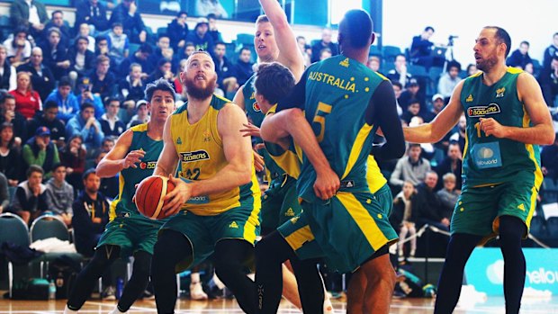 In the zone: Aron Baynes, a likely pick for Rio, under the basket during the scrimmage game.