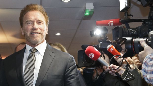 Arnold Schwarzenegger arrives at the climate change conference in Le Bourget, north of Paris.