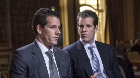 Cameron, left, and Tyler Winklevoss are believed to be the world's first bitcoin billionaires. 