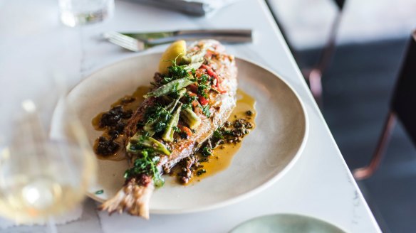 Whole baked snapper with chermoula and okra.